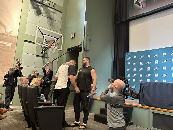 Travis Kelce and his older brother Jason Kelce share a moment after Jason announced his retirement from the NFL on March 4, 2024